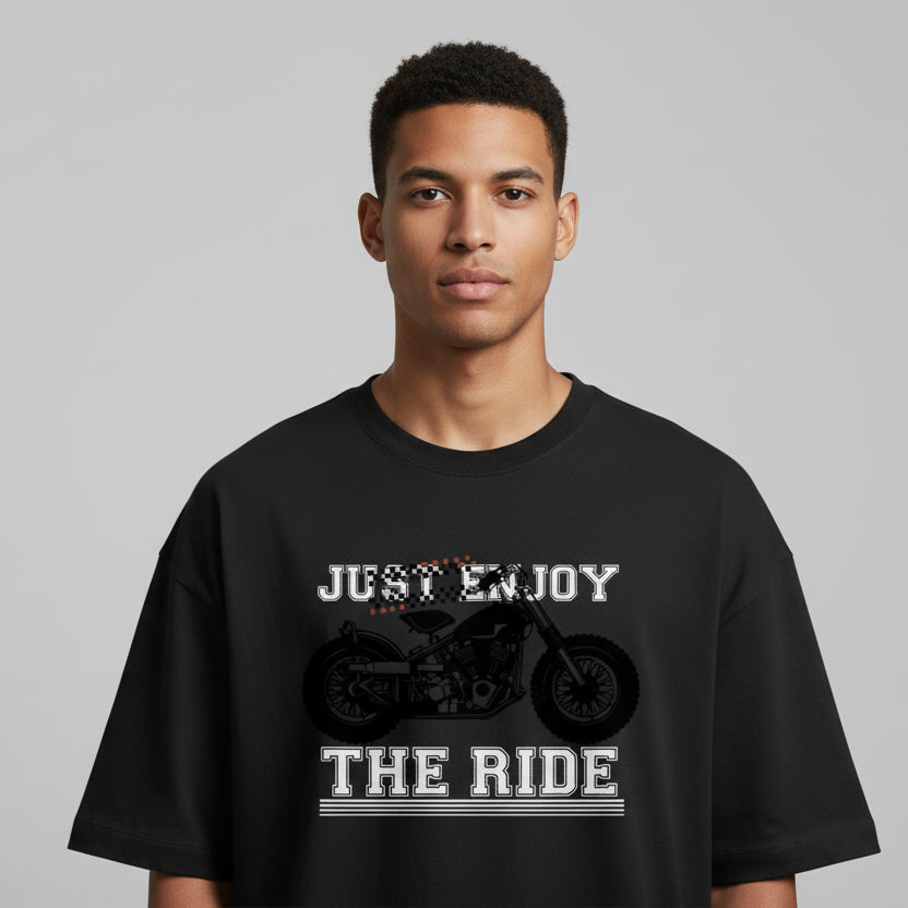 Black t-shirt with motorcycle graphic and text 'Just Enjoy The Ride' on a white background