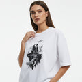 White t-shirt with black castle graphic on a white background