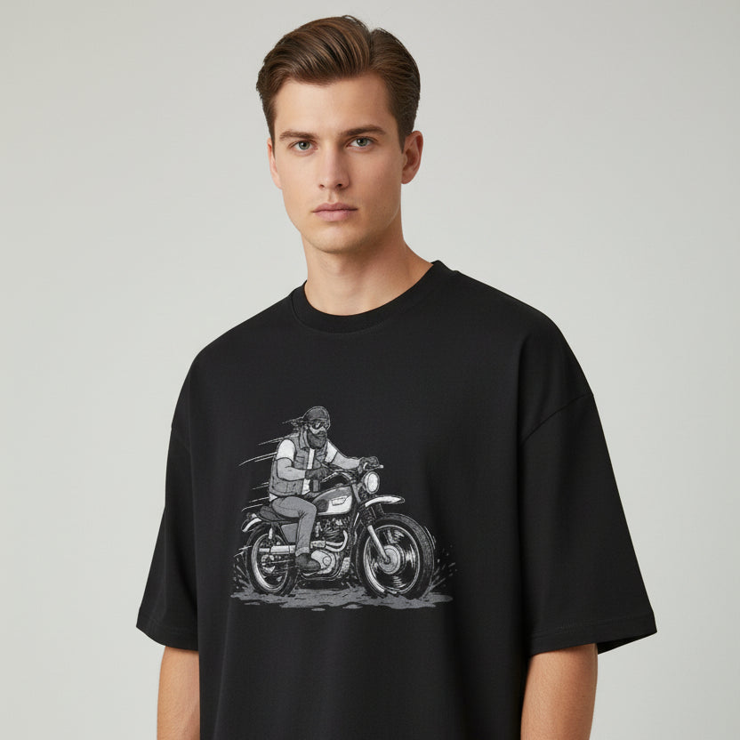 Black t-shirt with a moon and cloud design on a white background