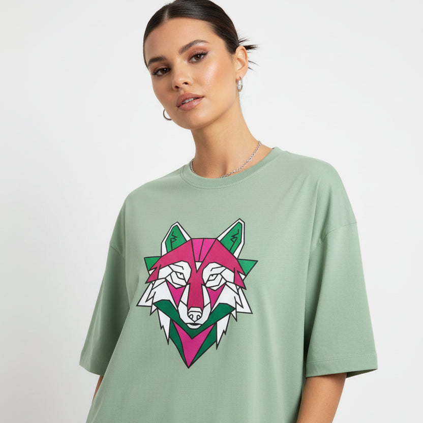 Green t-shirt with a wolf graphic design on a white background