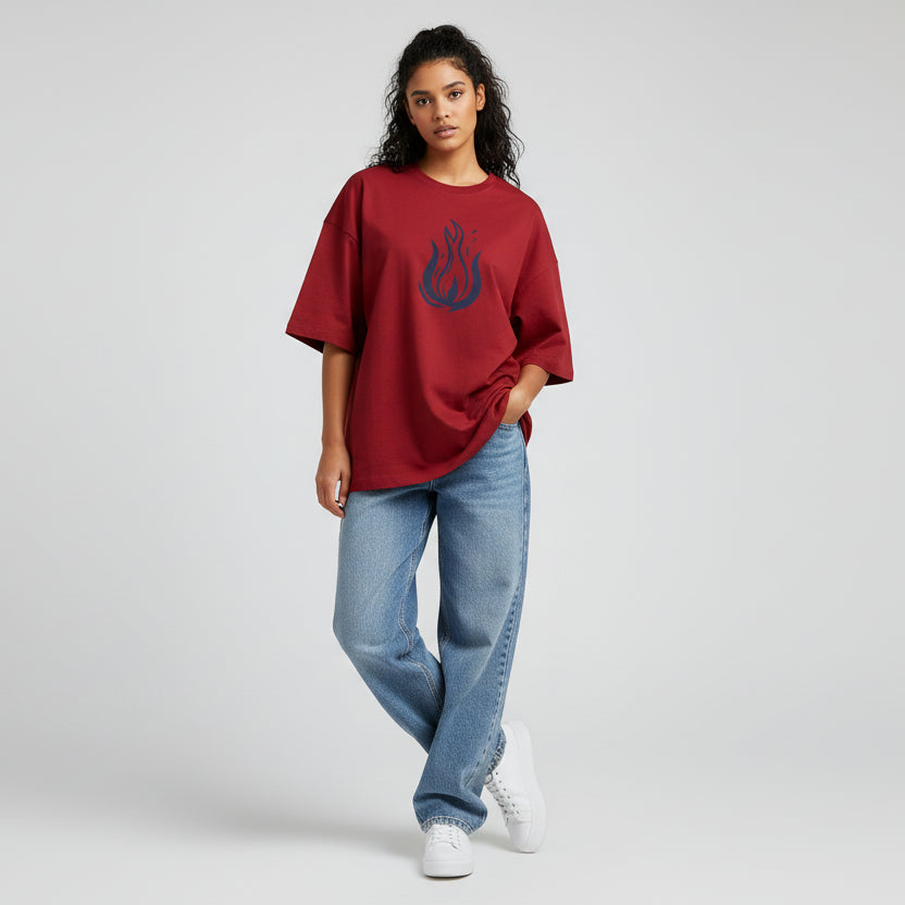 Red t-shirt with blue flame design on a white background