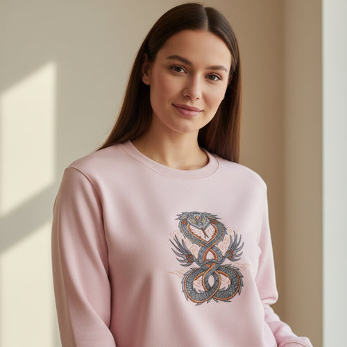 Pink sweatshirt with a snake design on a white background